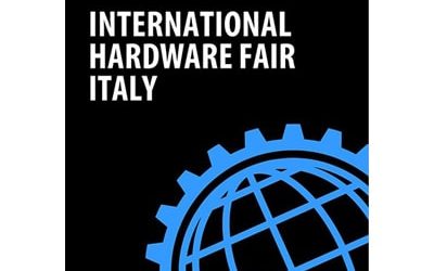 INT.  HARDWARE FAIR ITALY – May 2025